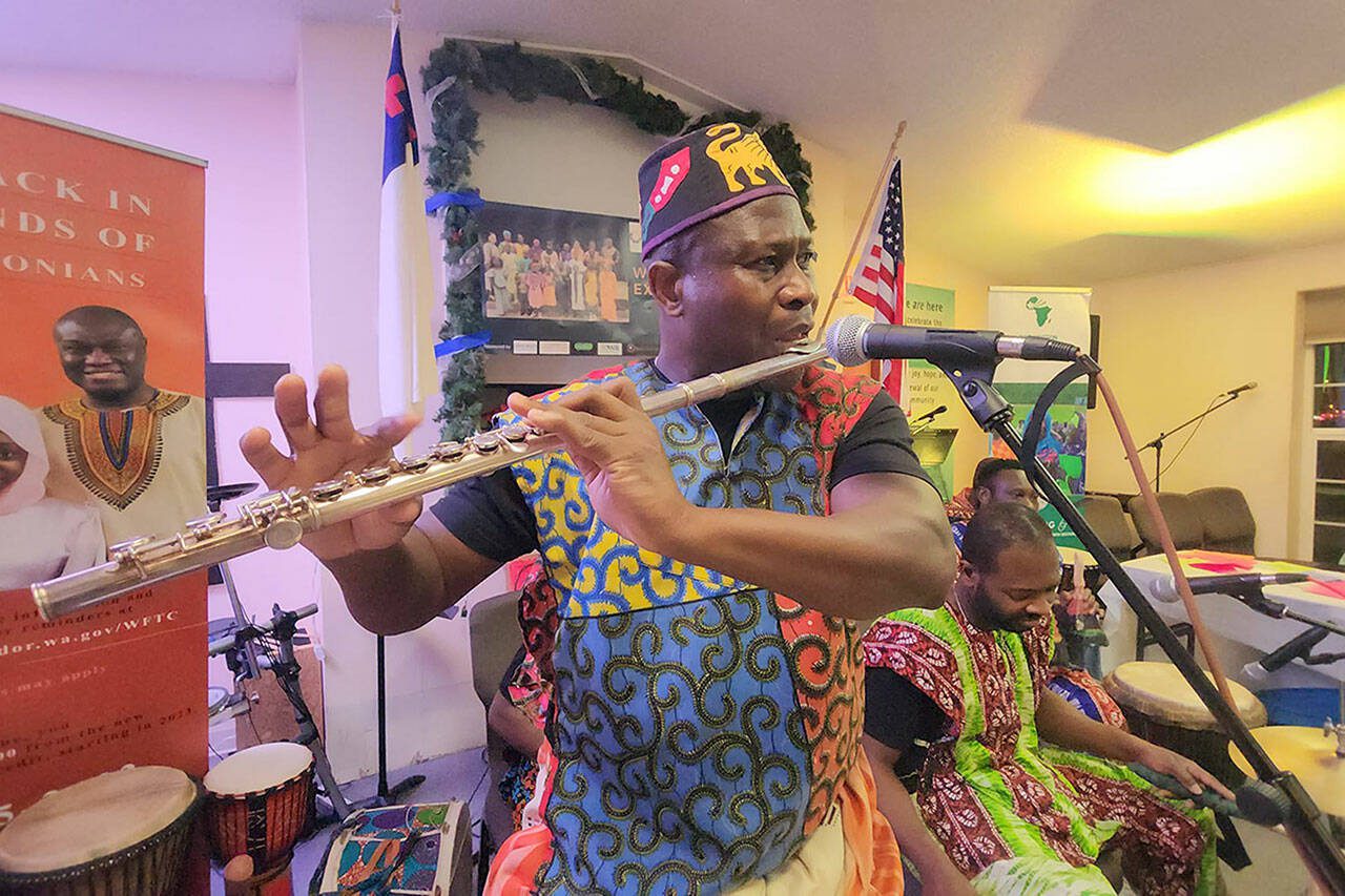 Etienne Cakpo, director of Seattle-based Gansango Dance & Music company, performs during the annual Bideww Arts Exhibition and Talent Show hosted by Washington West African Center on Dec. 30, 2022, at Neema Community Church in Everett. Gansango Dance & Music company is set to perform during the second-annual Sounds of Africa Festival on Aug. 17 in Everett. (Ousman Jarju / Washington West Africa Center)