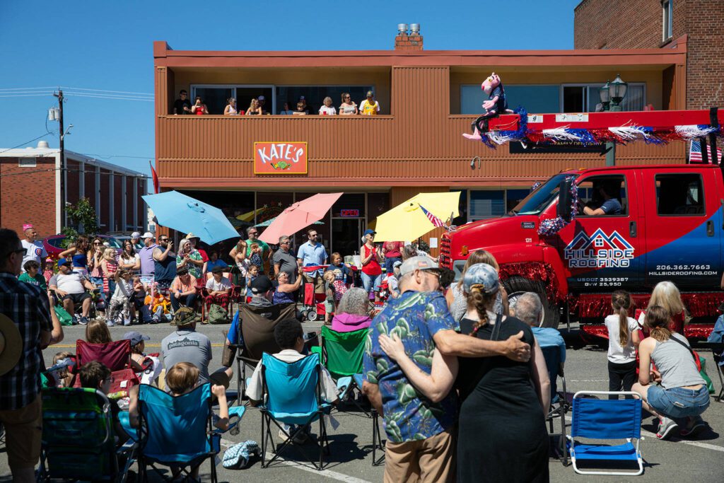People line Colby during Everett’s Fourth of July Parade on Thursday, July 4, 2024, in downtown Everett, Washington. (Ryan Berry / The Herald)
