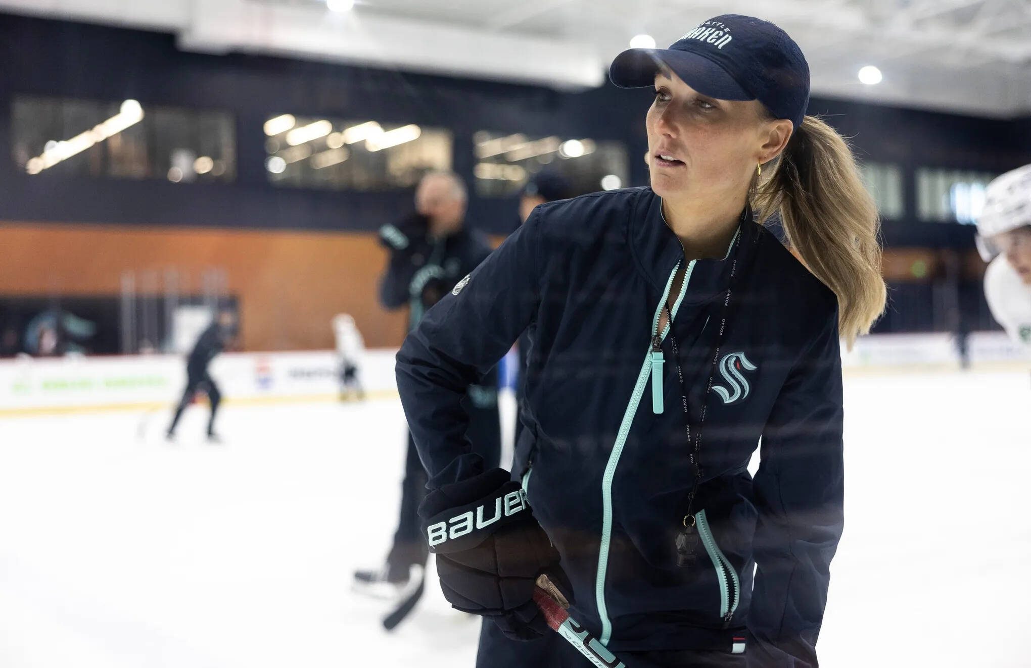 Kraken assistant coach Jessica Campbell runs a drill during a rookie development camp on Tuesday, July 2, in Seattle. (Nick Wagner / The Seattle Times)