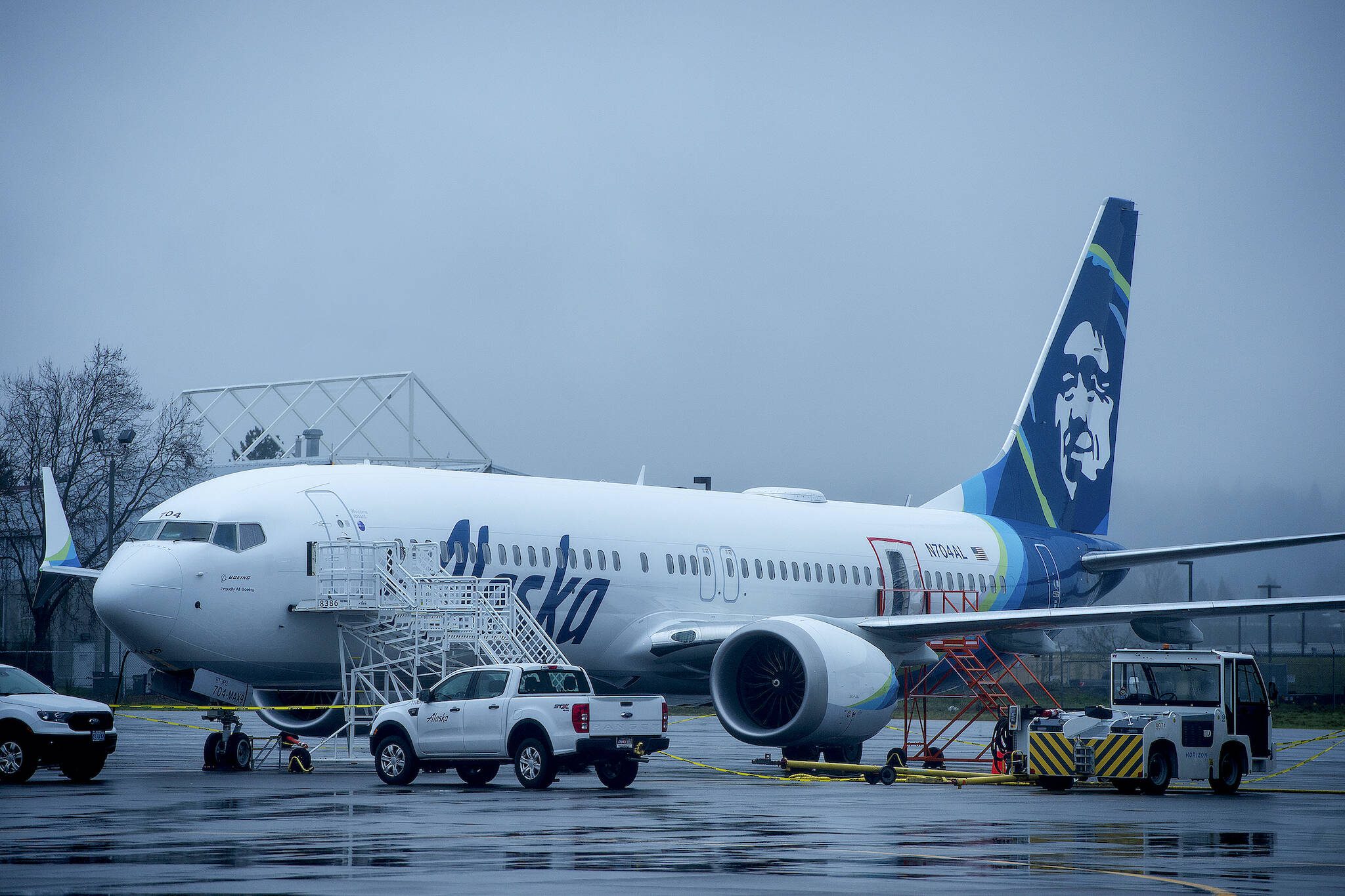 Alaska Airlines N704AL, a Boeing 737 Max 9 that had a door plug blow out from its fuselage midair, parked at a maintenance hanger at Portland International Airport in Portland, Oregon, on Monday, January 8, 2024. Boeing drew fresh criticism from a federal regulator on Thursday, June 27, over disclosures about the continuing investigation into the harrowing January flight. (Amanda Lucier/The New York Times)
