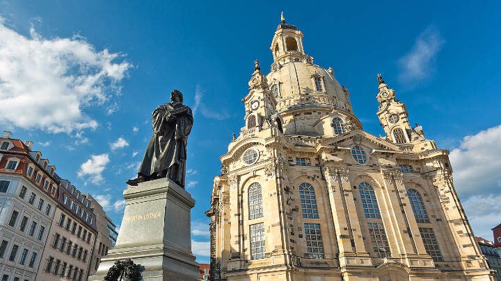 A statue of Protestant reformer Martin Luther looms large outside the lovingly rebuilt Frauenkirche, which had lain in ruins for nearly six decades since being destroyed in the Allied firebombing of Dresden in World War II. (Dominic Arizona Bonuccelli / Rick Steves’ Europe)