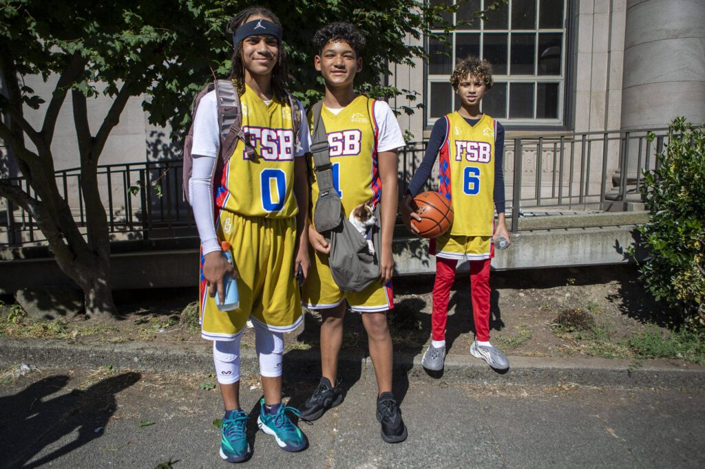 Members of the FSB team pose for a photo during the Everett 3on3 tournament in downtown Everett, Washington on Sunday, July 14, 2024. (Annie Barker / The Herald)
