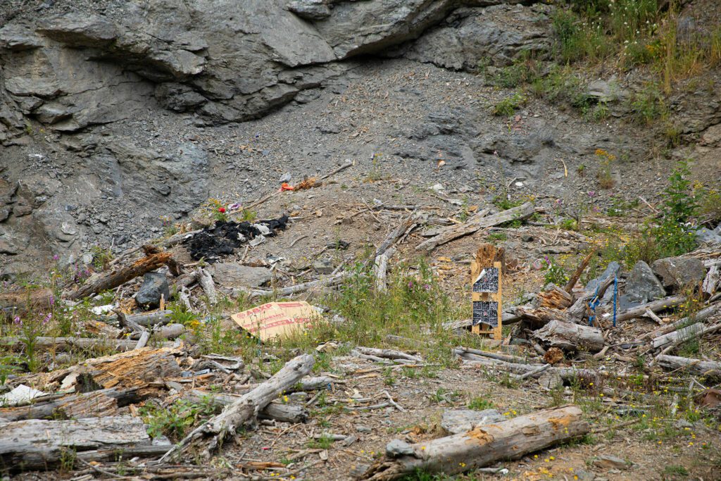 A small shooting pit sits along the side of Green Mountain Road on Wednesday, July 17, 2024, near Granite Falls, Washington. A number of areas on the road show signs of target practice. (Ryan Berry / The Herald)
