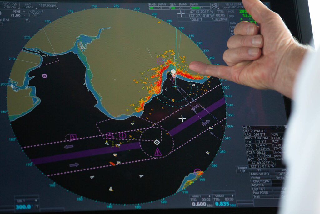 Captain Russell Fee explains the radar system used aboard the MV Spokane on the Edmonds/Kingston ferry route Thursday, July 18, 2024, near Edmonds, Washington. (Ryan Berry / The Herald)

