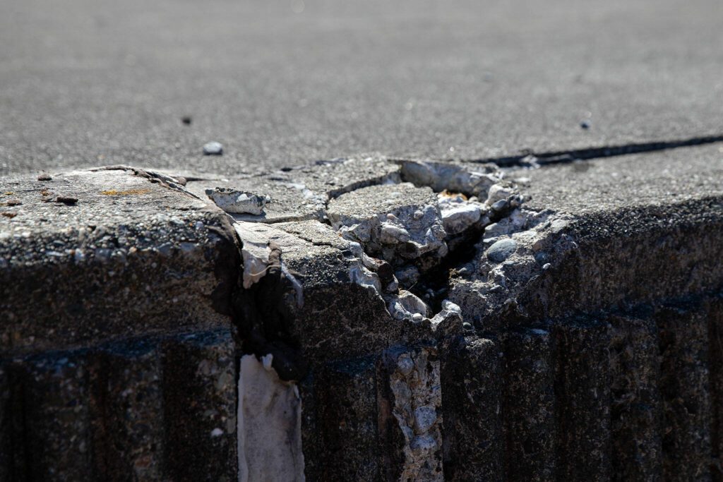 Wear and tear is apparent on the concrete exterior of Everett’s 101-year-old reservoir Tuesday, July 23, 2024, in Everett, Washington. (Ryan Berry / The Herald)
