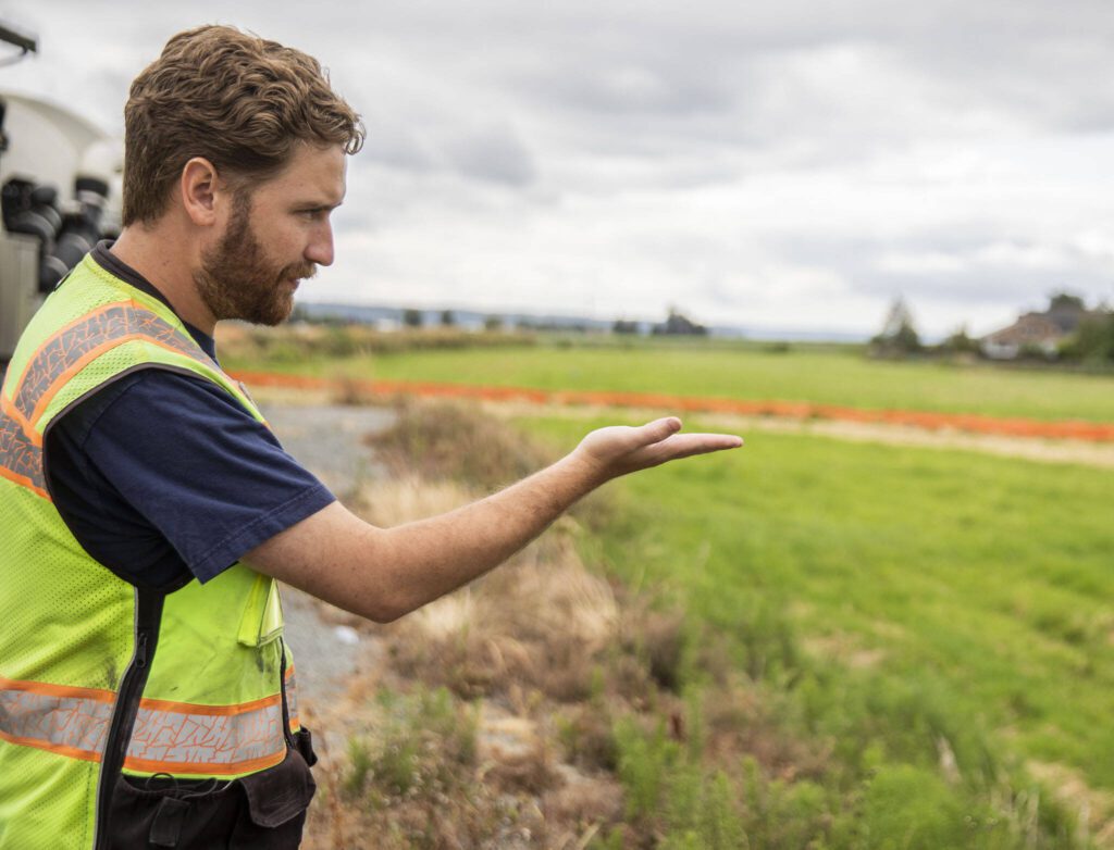 Stanwood Public Works city engineer Alan Lytton talks about the boardwalk section of the Port Susan Trail on Thursday, July 25, 2024 in Stanwood, Washington. (Olivia Vanni / The Herald)
