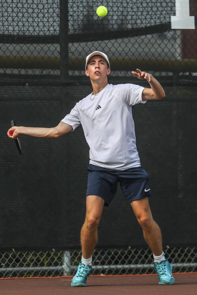 Shorewood’s Riley Boyd hits the ball during the boys doubles championship match at Snohomish Summer Smash at Snohomish High School in Snohomish, Washington on Sunday, July 21, 2024. (Annie Barker / The Herald)
