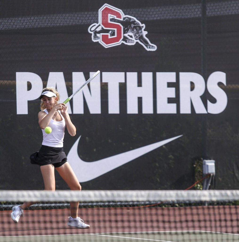 Lakeside’s Cate Lilleness hits the ball during the girls gold doubles championship match at the Snohomish Summer Smash at Snohomish High School in Snohomish, Washington on Sunday, July 21, 2024. (Annie Barker / The Herald)
