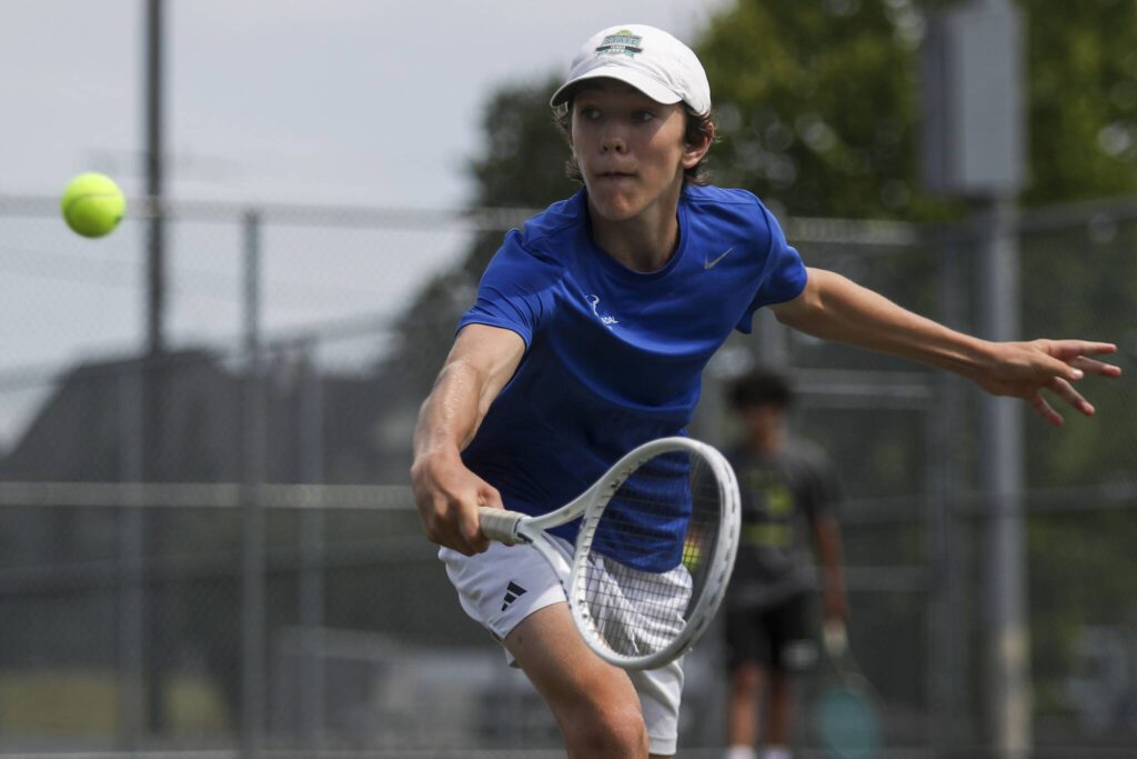 Shorewood’s Xander Gordon hits the ball during the boys singles championship match at Snohomish Summer Smash at Snohomish High School in Snohomish, Washington on Sunday, July 21, 2024. (Annie Barker / The Herald)
