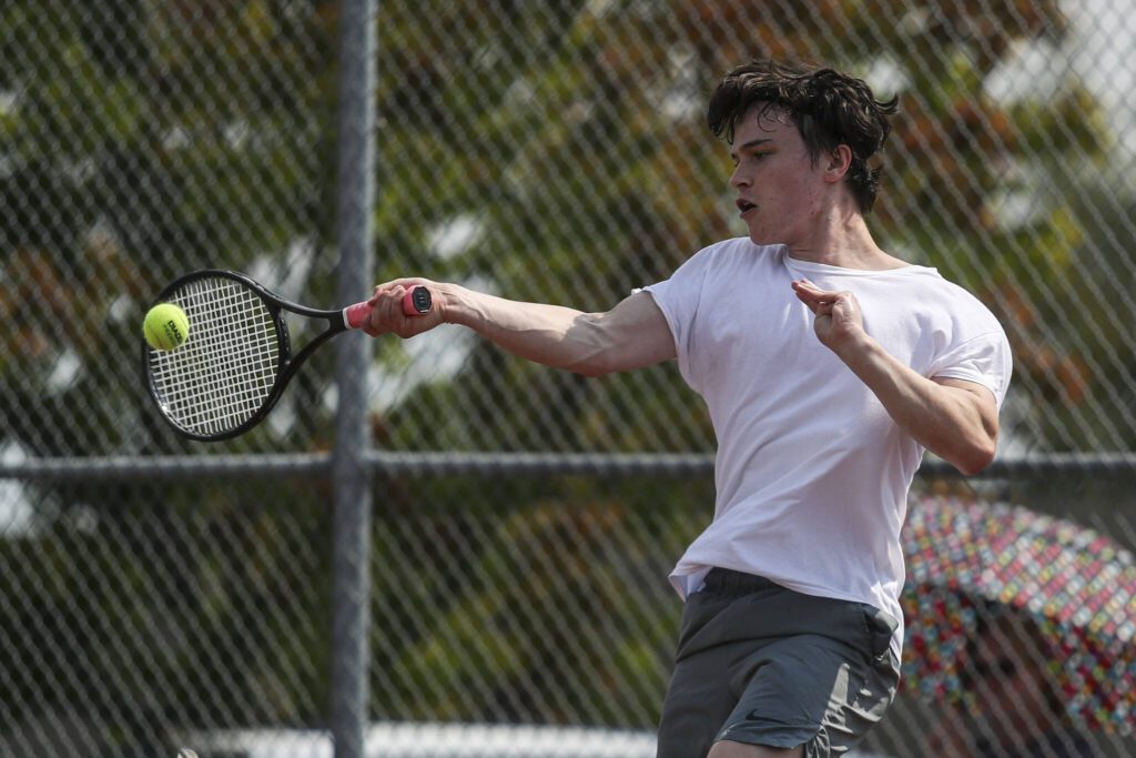 Archbishop Murphy’s Cole Balen hits the ball during the boys singles championship match at Snohomish Summer Smash at Snohomish High School in Snohomish, Washington on Sunday, July 21, 2024. (Annie Barker / The Herald)
