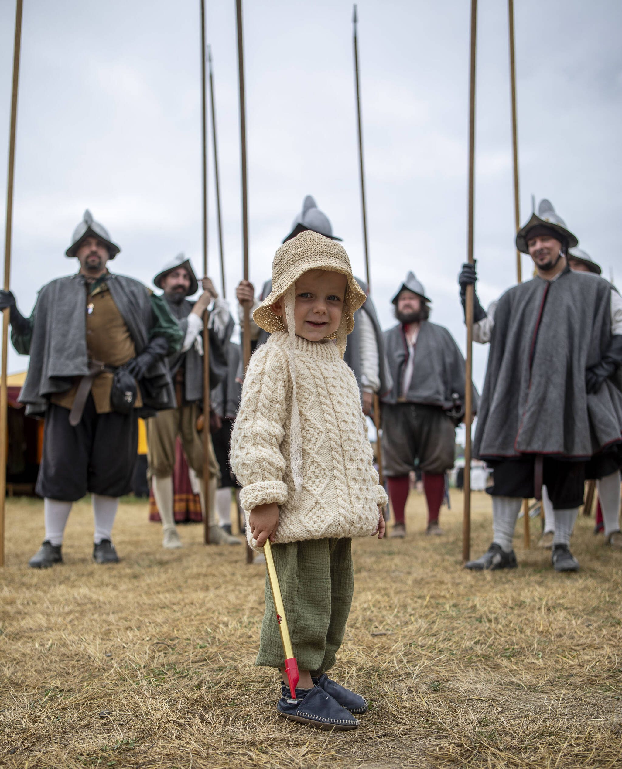 Orion Muhic, 2, holds a toy flute at the Washington Midsummer Renaissance Faire near Monroe on Sunday. (Annie Barker / The Herald)