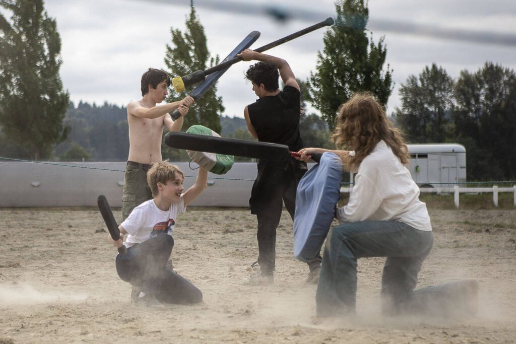 Kids feign battle during the Washington Midsummer Renaissance Faire at Sky Meadows Park in Snohomish, Washington on Sunday, Aug. 06, 2023. (Annie Barker / The Herald)
