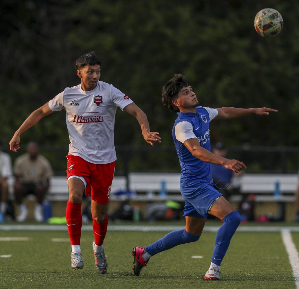 Everett’s Ignacio Brandan (11) fights for the ball during the EPLWA championships between semi-pro men’s soccer team Everett Jets FC and Yakima United at Archbishop Murphy High School in Everett, Washington on Saturday, July 27, 2024. Yakima won, 6-1. (Annie Barker / The Herald)

