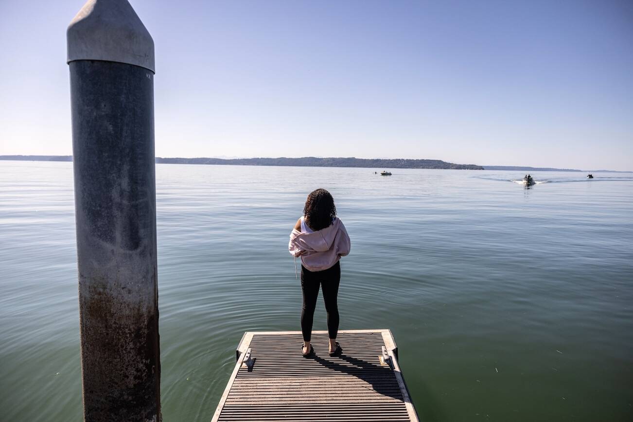Hannah Power, 18, is photographed at Redondo Park near her home in Federal Way, Wash. on Tuesday, July 16, 2024. Power was commercially sexually exploited by a man she met on Tinder in June 2022, when she was 16. The man met her in a hotel in Lynnwood and had her perform on Chaturbate, a popular online platform with uncensored live webcam shows. After that night, Hannah decided to drop out of high school and has been struggling with depression and anxiety stemming from the exploitation.

Photo by Mike Kane for InvestigateWest