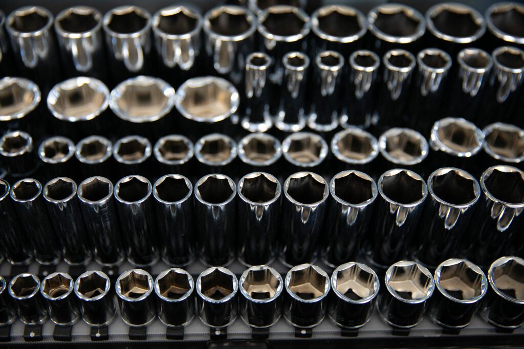 Sockets and other supplies are aplenty at Delta Garage, where all funding goes toward supplying and insuring the program, on July 5 in Everett. (Ryan Berry / The Herald)
