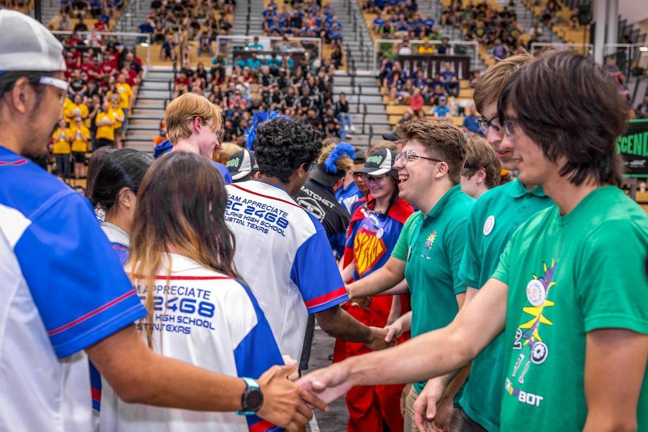 Henry M. Jackson High School’s robotic team, Jack in the Bot, shake hands at the 2024 Indiana Robotics Invitational.(Henry M. Jackson High School)