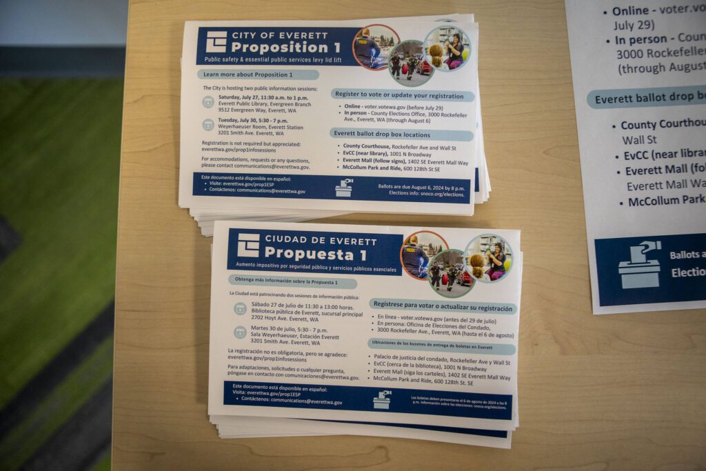 Flyers are displayed during a public information session hosted by the city of Everett to learn about the city’s property tax levy on the ballot in August at the Everett Public Library Evergreen Branch in Everett, Washington on Saturday, July 27, 2024. (Annie Barker / The Herald)
