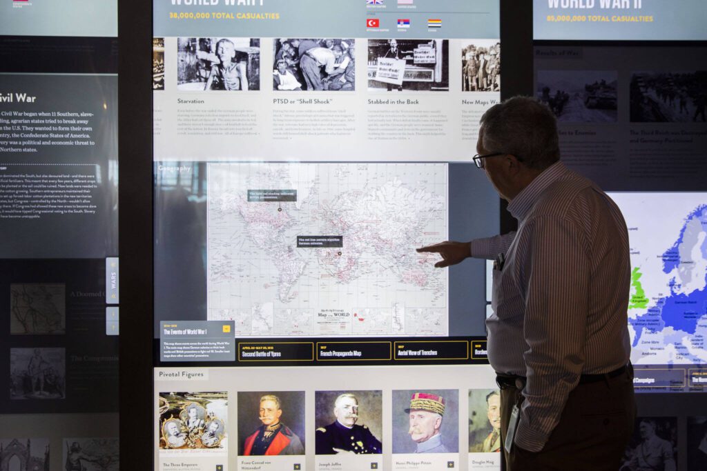 An interactive history display wall in the Why War: The Causes of Conflict area of the Flying Heritage & Combat Armor Museum. Olivia Vanni / The Herald
