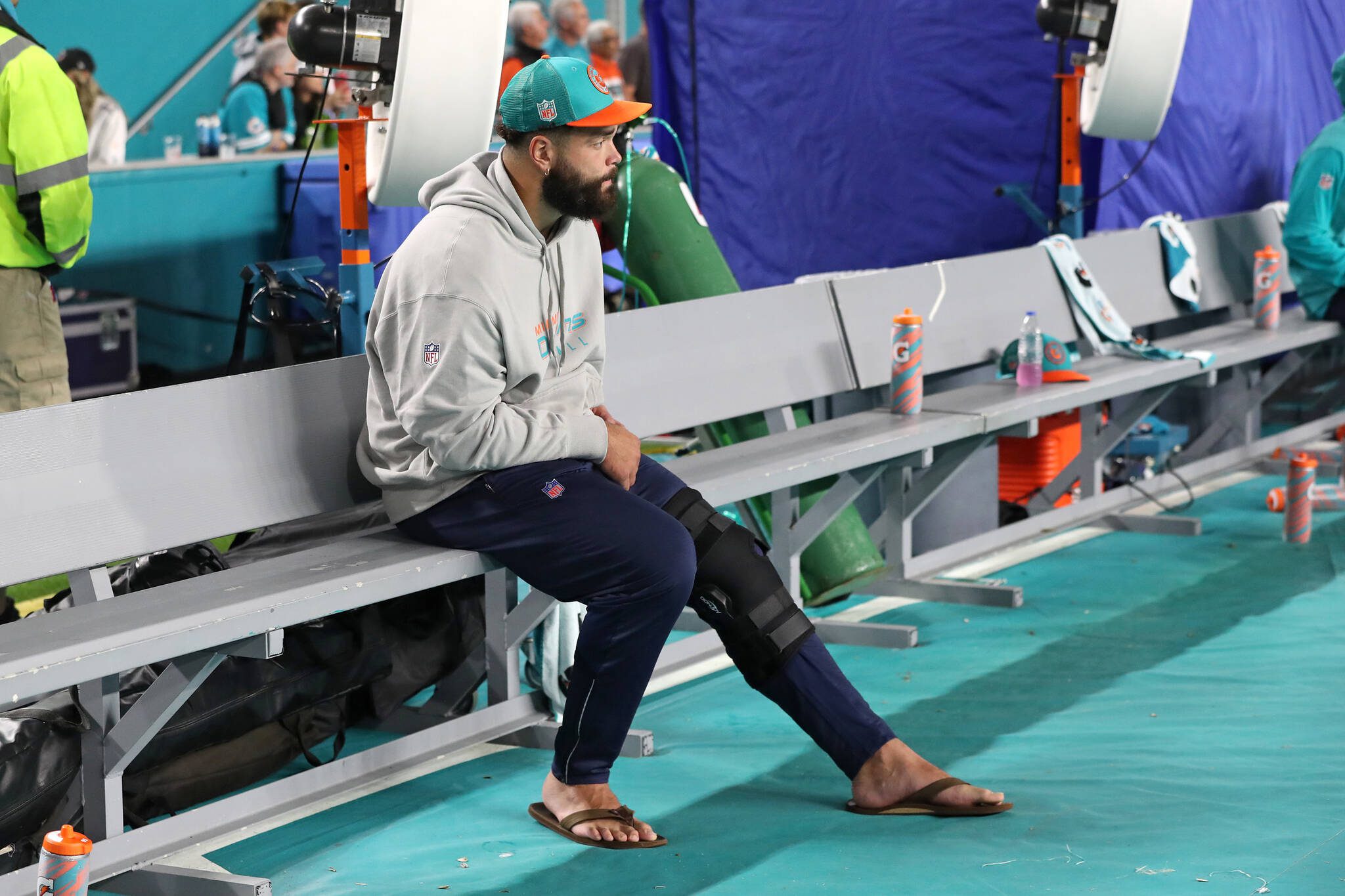 Miami Dolphins offensive lineman Connor Williams on the bench while recovering from a knee injury during the first half against the Tennessee Titans at Hard Rock Stadium on Monday, Dec. 11, 2023, in Miami Gardens, Florida. (John McCall / South Florida Sun Sentinel / TNS)