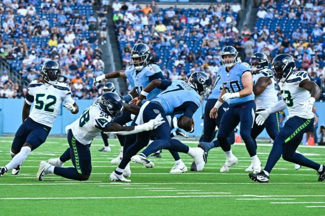 Seattle Seahawks linebacker Derik Hall (58) sacks Tennessee Titans quarterback Malik Willis in the first quarter of the Seahawks’ 16-15 NFL preseason loss on Saturday, Aug. 17 at Nissan Stadium in Nashville, Tenn. (Photo courtesy of the Seattle Seahawks)
