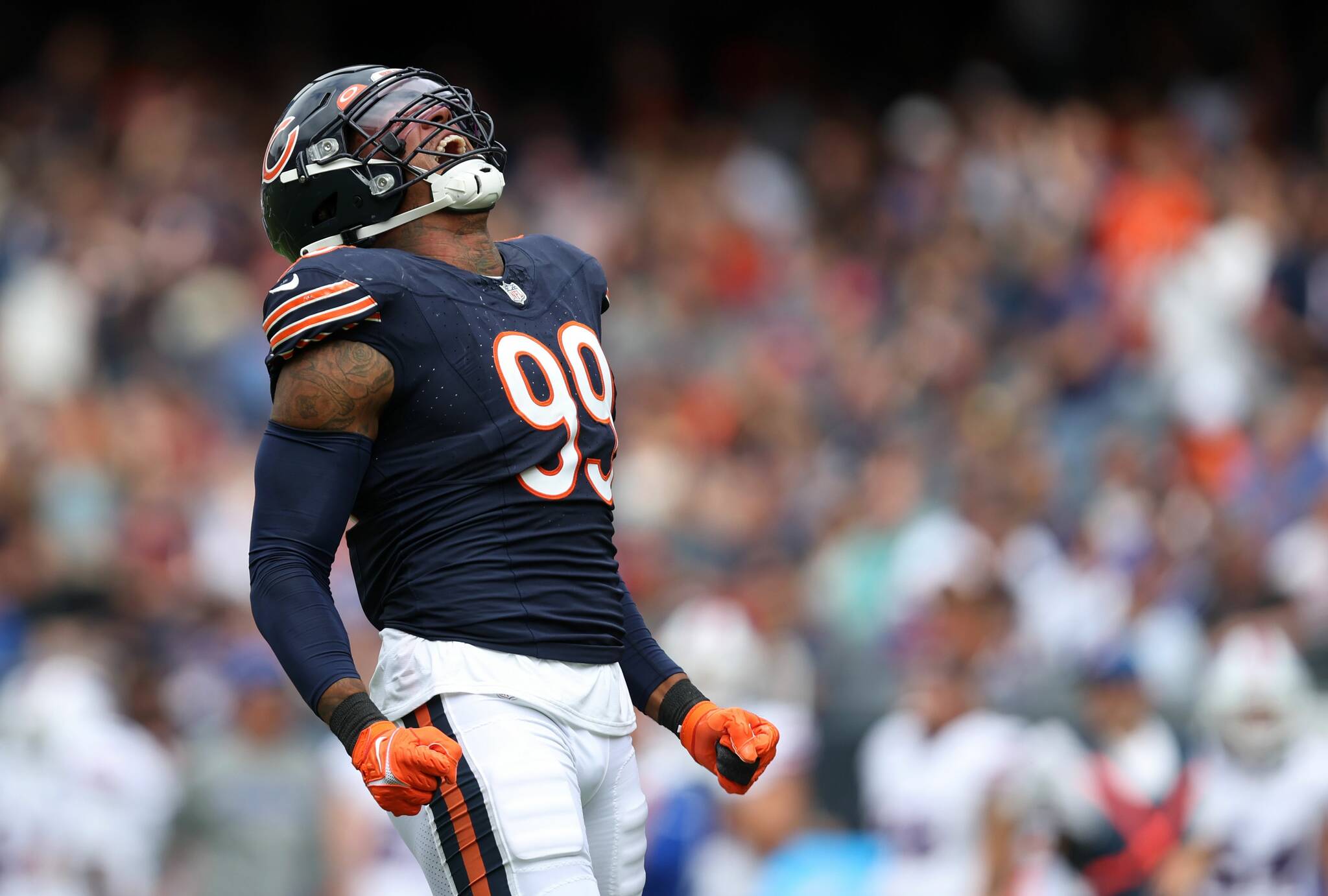 Former Bears defensive end Trevis Gipson, who was traded to the Seattle Seahawks on Monday, celebrates after a strip-sack in a preseason game against the Bills on Aug. 26, 2023, at Soldier Field.