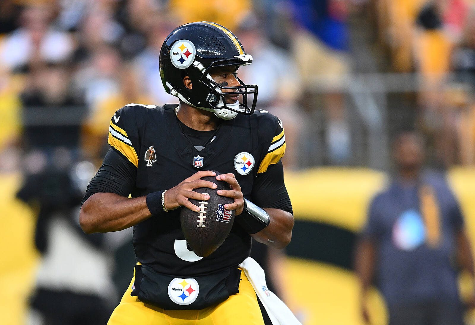 Joe Sargent / Getty Images / Tribune News Service
Russell Wilson of the Pittsburgh Steelers looks to pass against the Buffalo Bills in the first quarter during a preseason game at Acrisure Stadium on Aug. 17 in Pittsburgh.