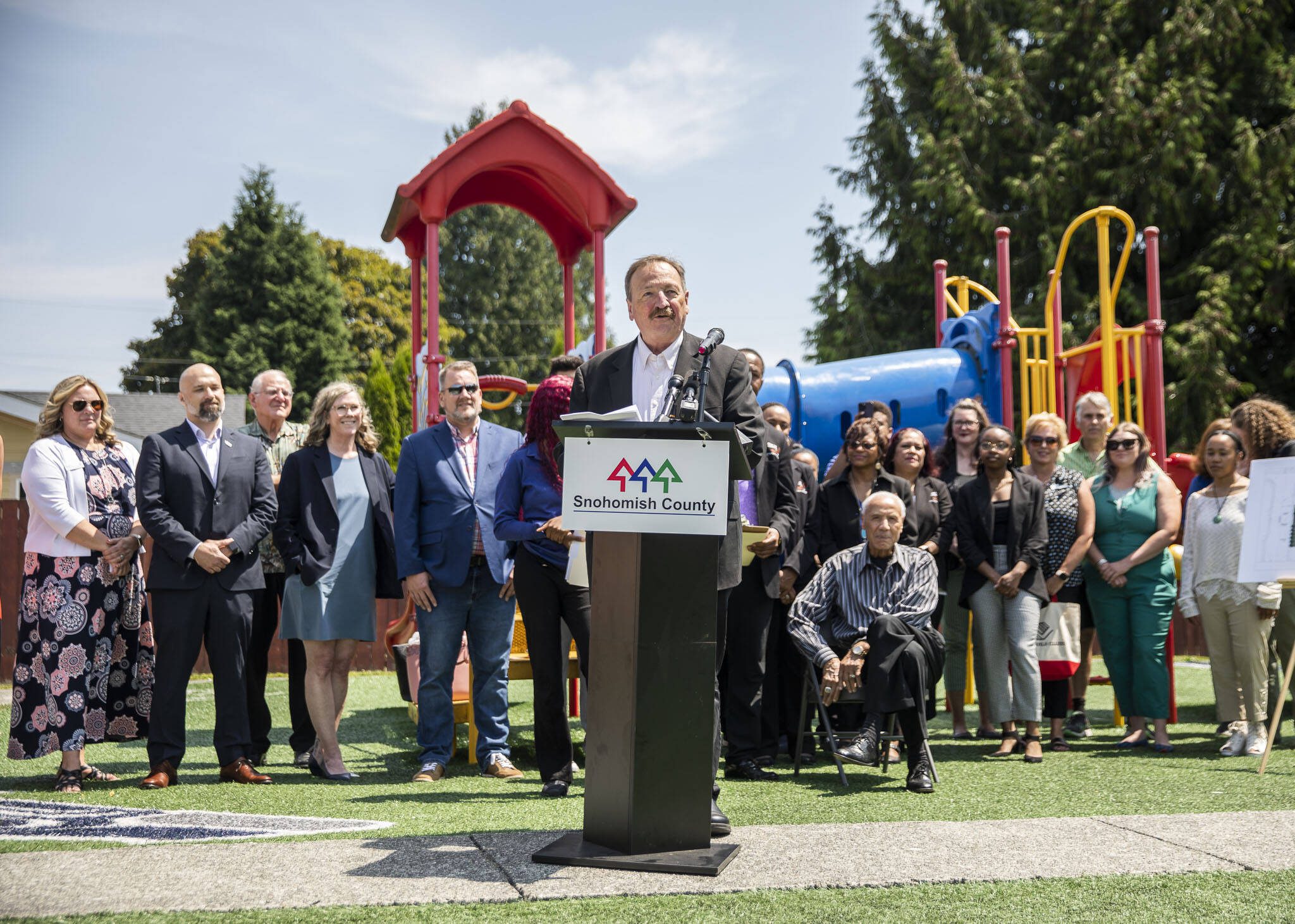 Snohomish County Executive Dave Somers speaks during an event announcing funding for affordable child care slots held at Rise Up Academy last year in Everett. (Olivia Vanni / The Herald)