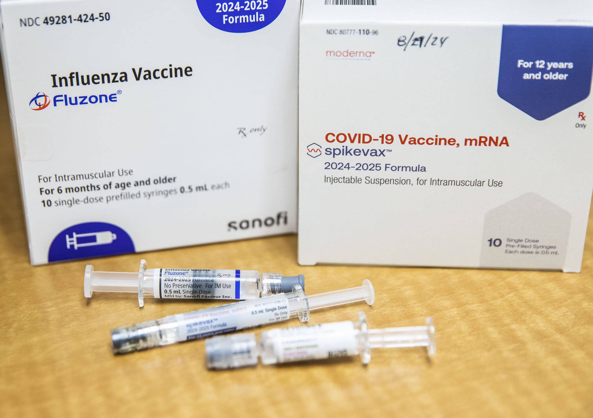 Flu and COVID vaccine options available at QFC on Thursday in Everett. (Olivia Vanni / The Herald)