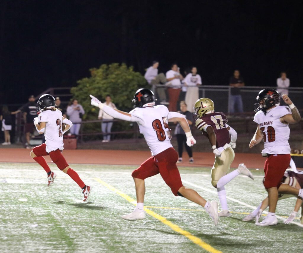 Archbishop Murphy junior running back Marcus Gaffney scores one of his four touchdowns during the Archbishop Murphy-Lakewood football game at Lakewood High School on Sept. 6, 2024. The Wildcats won 48-24. (Taras McCurdie / The Herald)
