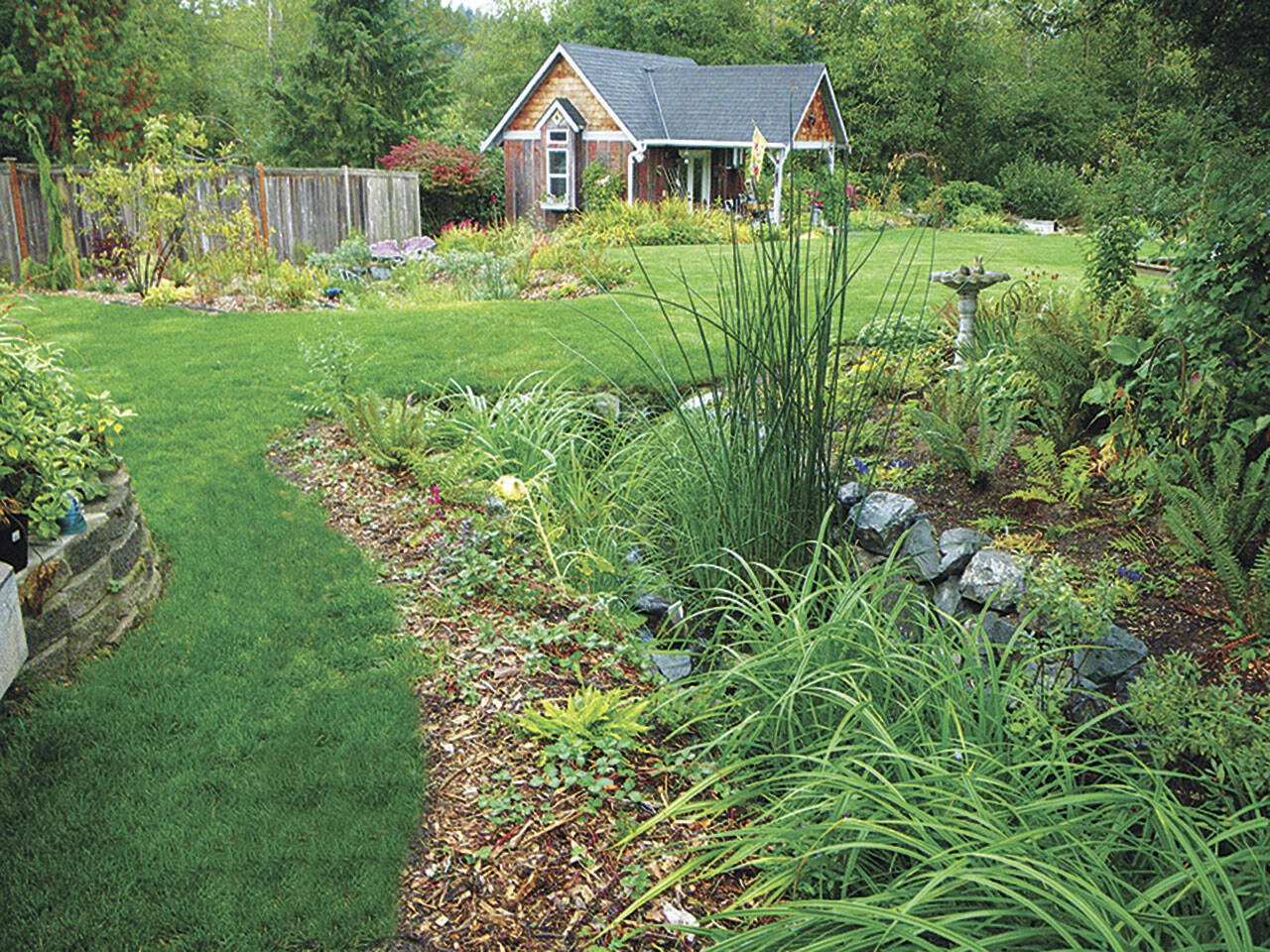 One example of a completed rain garden, established at a home in Monroe. The Adopt a Stream Foundation is hosting a free rain garden workshop Sept. 19. (Courtesy of Snohomish County)