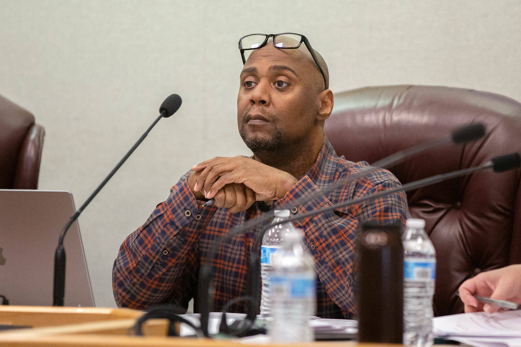 Superintendent Zachary Robbins listens to public comment during a Marysville School District board meeting on July 22 in Marysville. (Ryan Berry / The Herald)