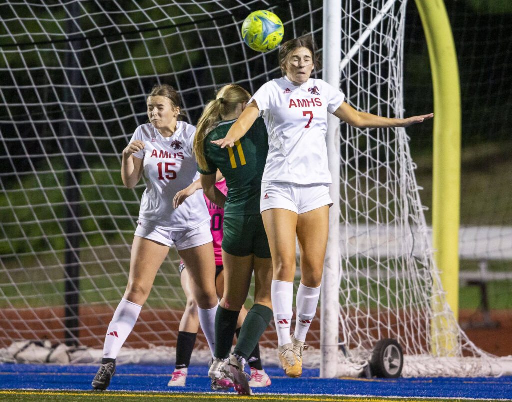 Archbishop Murphy’s Sophie Pioli leaps in the air to head the ball away from the goal during the game against Shorecrest on Tuesday, Sept. 17, 2024 in Shoreline, Washington. (Olivia Vanni / The Herald)
