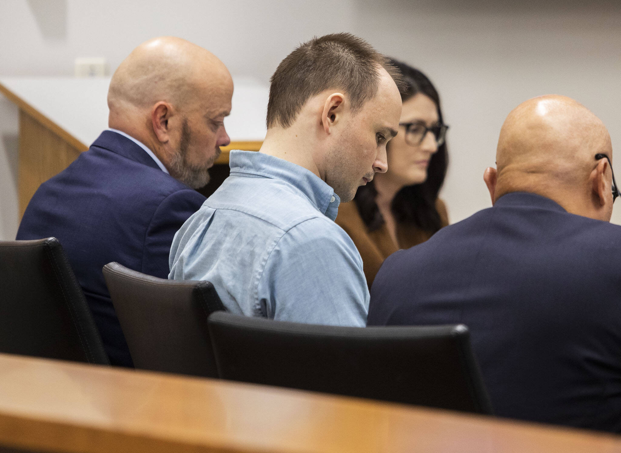 Christian Sayre sits in the courtroom before the start of jury selection for his trial at the Snohomish County Courthouse on Tuesday, Sept. 24, 2024 in Everett, Washington. (Olivia Vanni / The Herald)