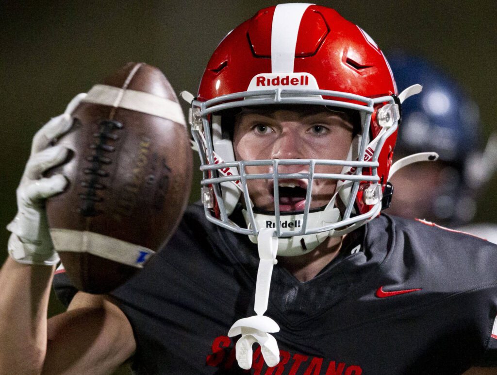 Stanwood’s Cole Williams reacts to the referee call an incomplete pass instead of an interception during the game against Arlington on Friday, Oct. 11, 2024 in Stanwood, Washington. (Olivia Vanni / The Herald)
