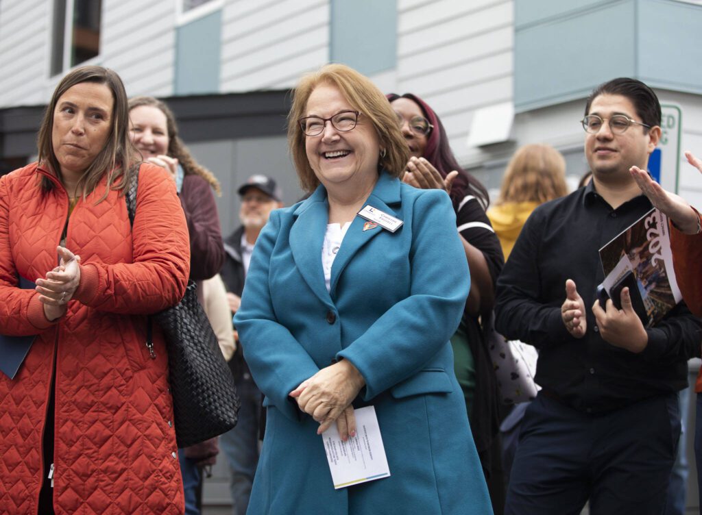 Lynnwood Mayor Christine Frizzell smiles while being acknowledged at the Madrona Highlands welcoming ceremony on Tuesday, Oct. 15, 2024 in Edmonds, Washington. (Olivia Vanni / The Herald)
