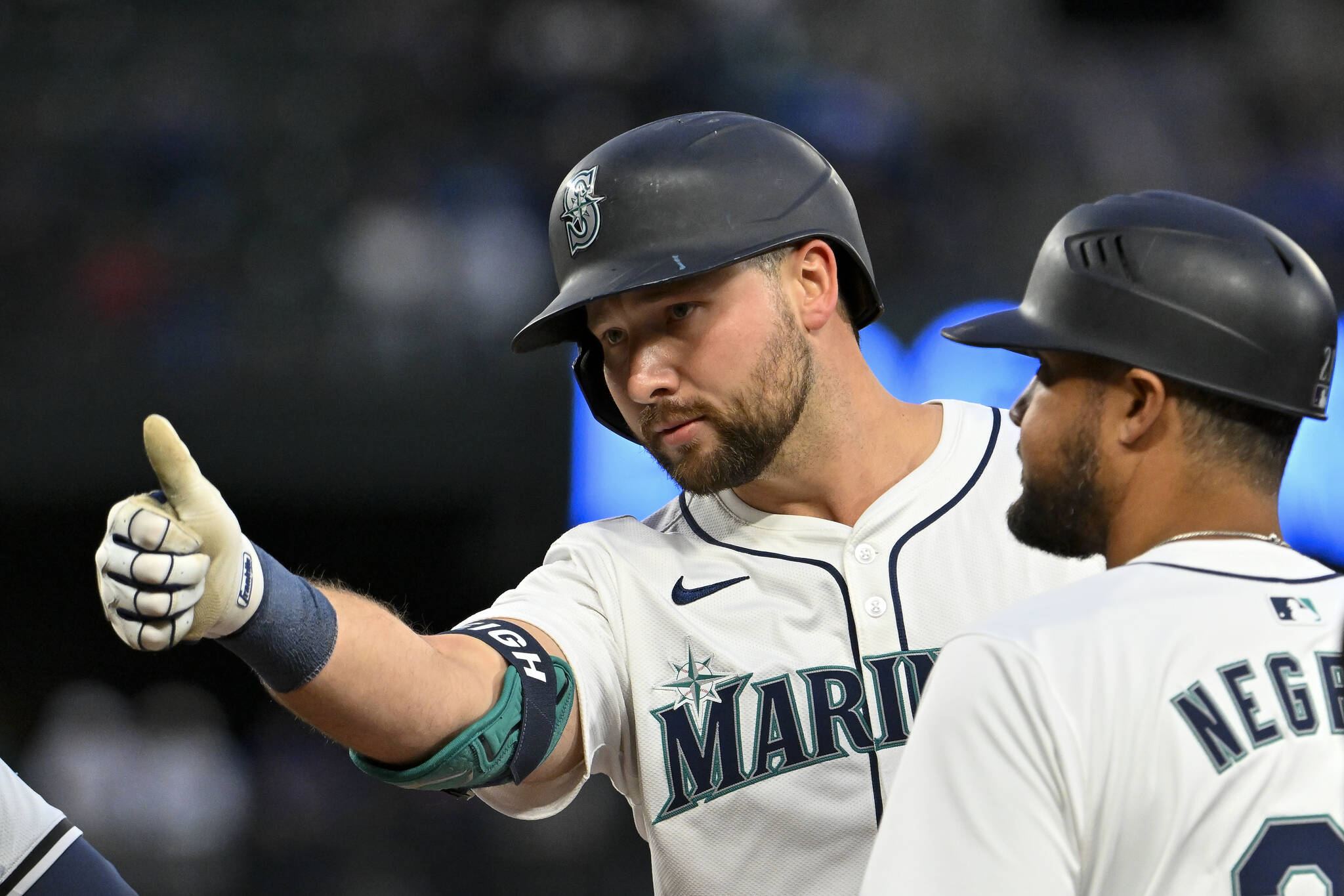 Alika Jenner / Getty Images / Tribune News Services
The Seattle Mariners’ Cal Raleigh gestures after hitting a single during the second inning against the Cleveland Guardians at T-Mobile Park on Tuesday, April 2, in Seattle.