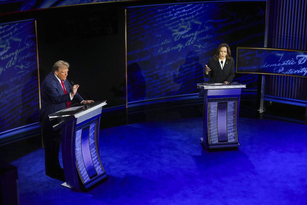 FILE — Former President Donald Trump and Vice President Kamala Harris speak over each other during the presidential debate at the National Constitution Center in Philadelphia, Sept. 10, 2024. Trump repeatedly spread falsehoods about immigrants in Springfield, Ohio, during the presidential debate, and a flood of threats to Jamie McGregor, CEO of McGregor Metal Co., his family, and his business followed. (Doug Mills/The New York Times)