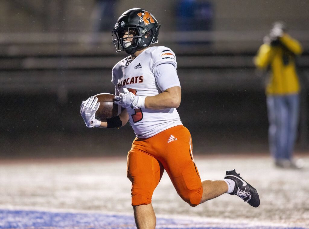 Monroe’s Aaron Clifton runs the ball into the end zone for a touchdown during the game against Shorecrest on Friday, Oct. 18, 2024 in Shoreline, Washington. (Olivia Vanni / The Herald)

