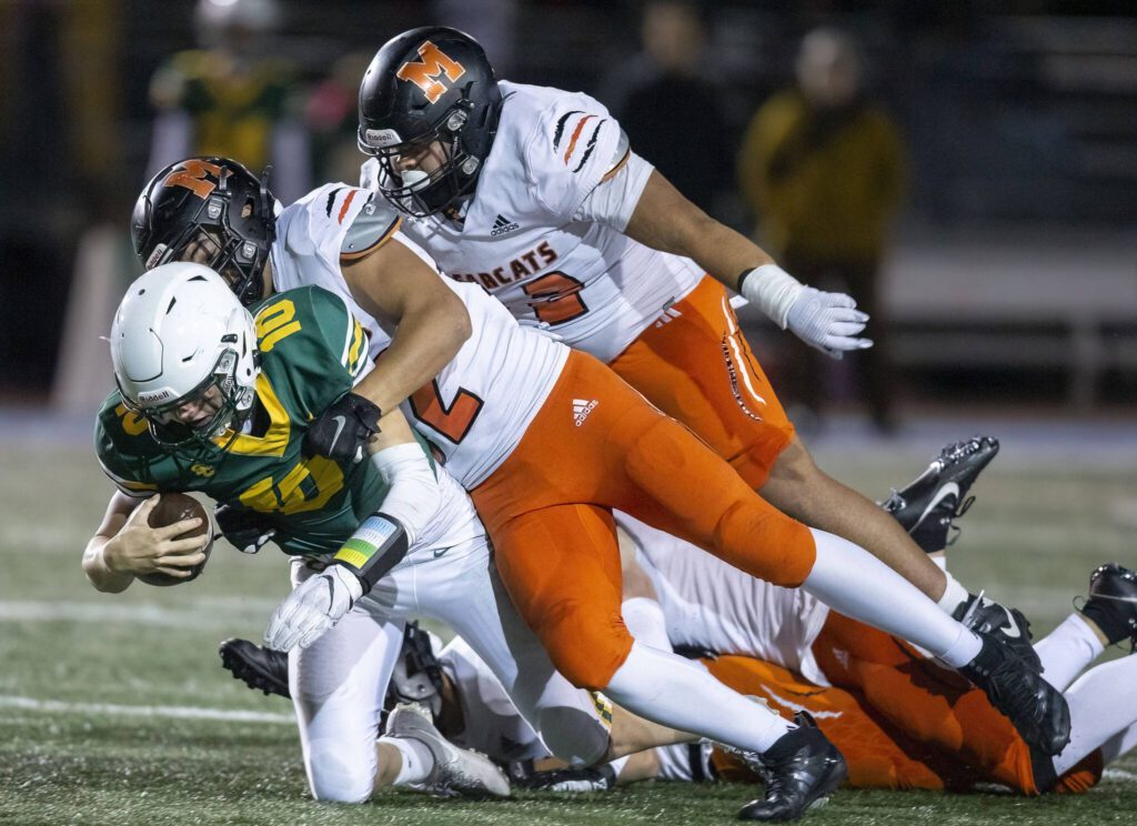Monroe’s Aiden Boldt sacks Shorecrest’s quarterback during the game on Friday, Oct. 18, 2024 in Shoreline, Washington. (Olivia Vanni / The Herald)
