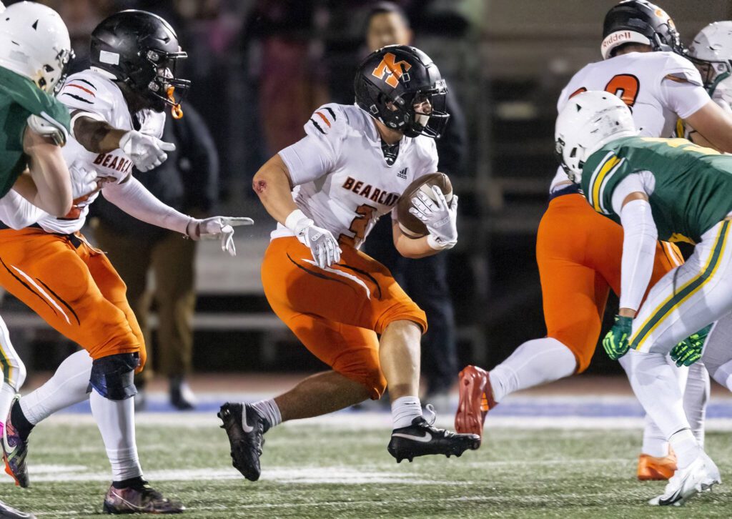 Monroe’s Aaron Clifton runs through an opening during the game against Shorecrest on Friday, Oct. 18, 2024 in Shoreline, Washington. (Olivia Vanni / The Herald)

