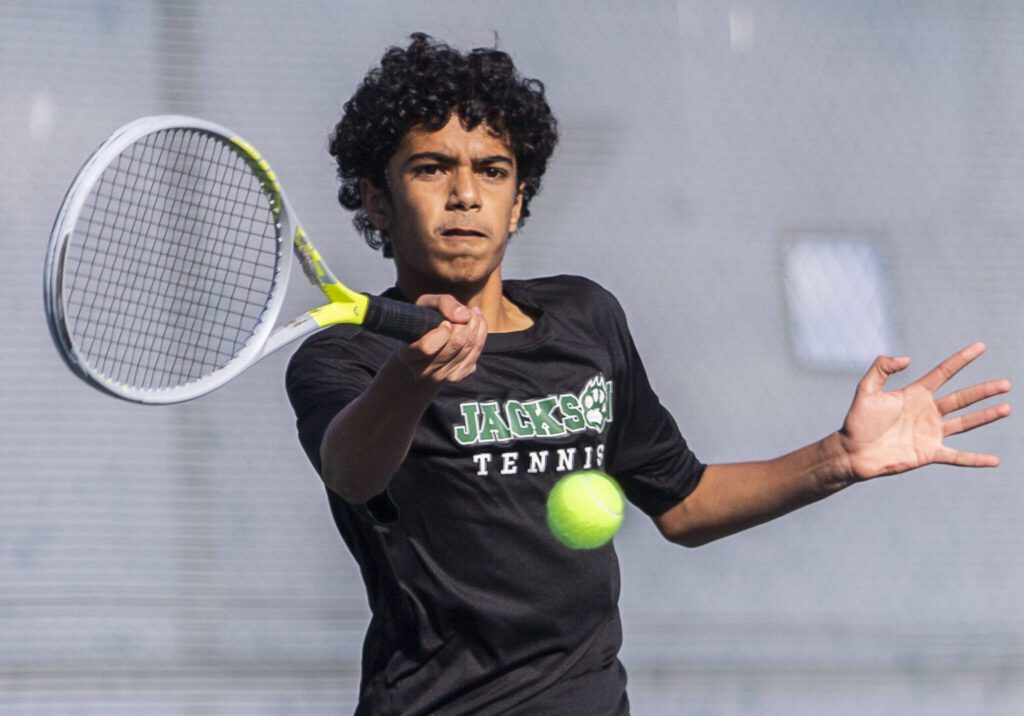 Rajveer Lahankar hits the ball during the district championship doubles match on Thursday, Oct. 24, 2024 in Snohomish, Washington. (Olivia Vanni / The Herald)
