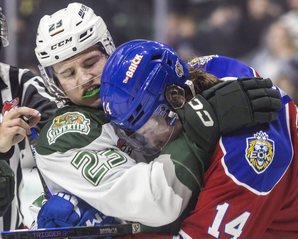 Silvertips’ Lukas Kaplan grabs an Edmonton player during the game against the Edmonton Oil Kings on Friday, Oct. 25, 2024 in Everett, Washington. (Olivia Vanni / The Herald)
