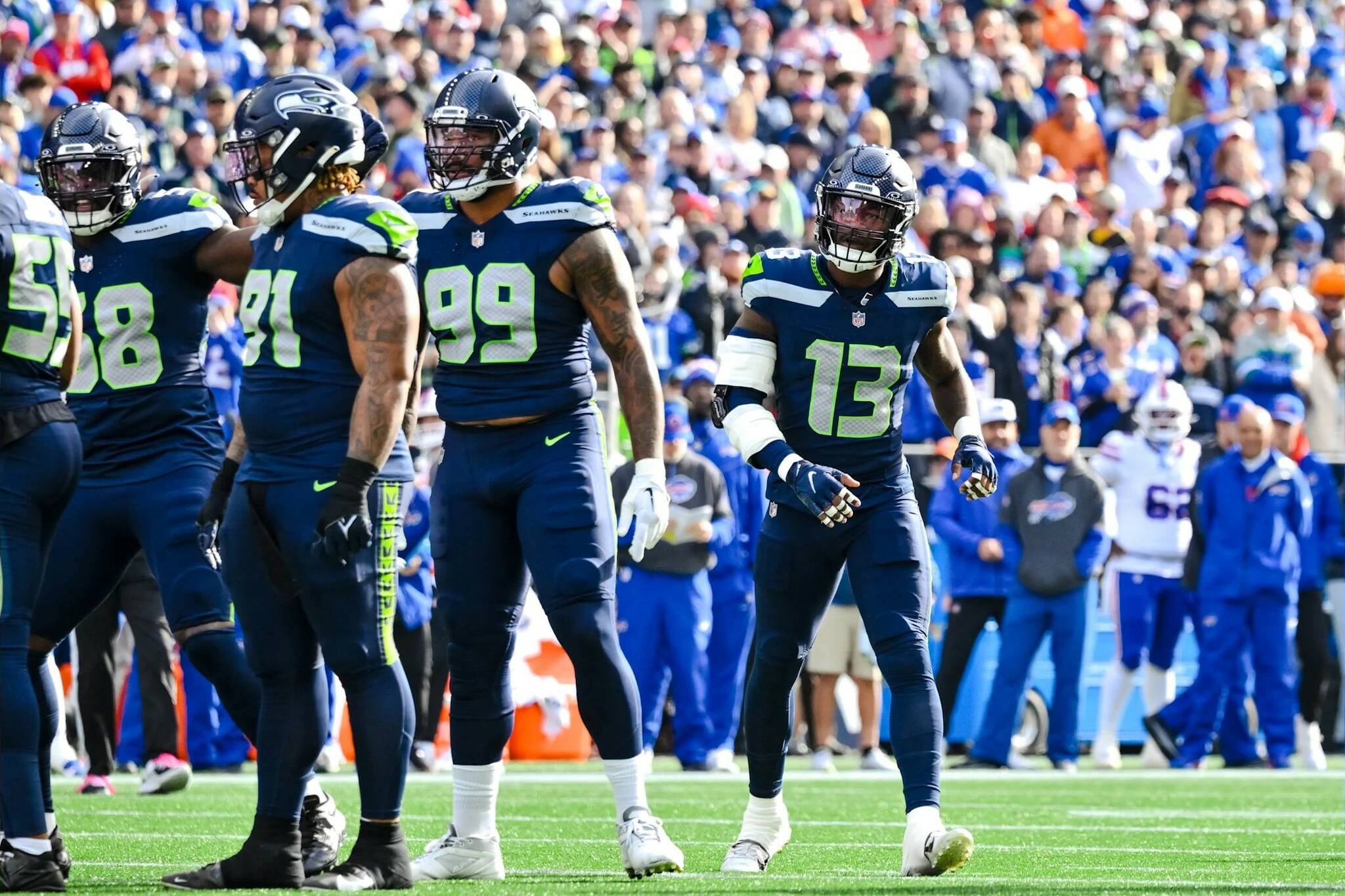 Seahawks linebacker Ernest Jones IV (13), who played every defensive snap against the Buffalo Bills three days after joining the team, lines up at Lumen Field on Oct. 27, 2024. (Photo courtesy of the Seattle Seahawks)