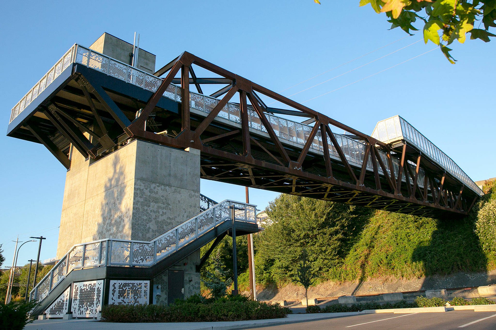 The Grand Avenue Park Bridge is seen as the sun sets in 2022 in Everett. (Ryan Berry / The Herald)