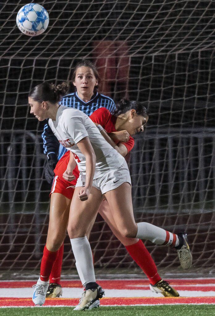Mountlake Terrace’s Claire August deflects the ball into the net to score during the 3A district game against Stanwood on Thursday, Oct. 31, 2024 in Stanwood, Washington. (Olivia Vanni / The Herald)
