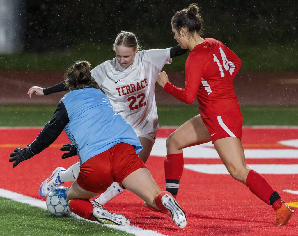 Mountlake Terrace’s Bella Fedyurina scrambles to get a shot off in the box during the 3A district game against Stanwood on Thursday, Oct. 31, 2024 in Stanwood, Washington. (Olivia Vanni / The Herald)
