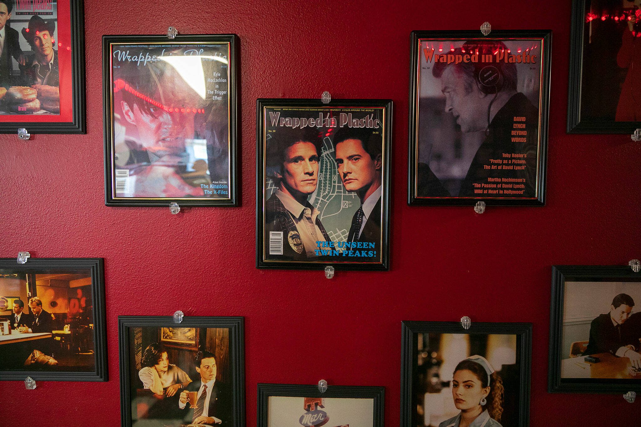 “Twin Peaks” photos and memorabilia cover the walls at Twede’s Cafe on Sunday, June 9, 2024, in North Bend, Washington. (Ryan Berry / The Herald)