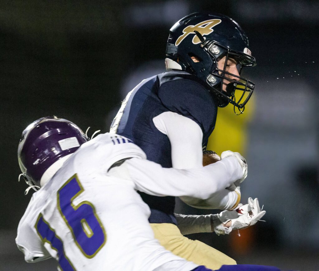 Arlington’s Kaid Hunter makes a catch during the game against Lake Stevens on Friday, Nov. 1, 2024 in Arlington, Washington. (Olivia Vanni / The Herald)
