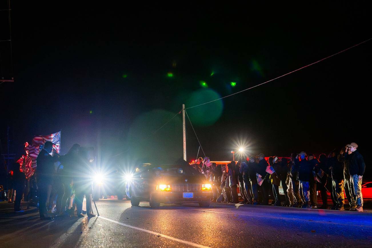 A procession honors Lt. Serena “Dug” Wileman, 31, as her remains were transported to Oak Harbor on Monday night. (Photo provided by Naval Air Station Whidbey Island)