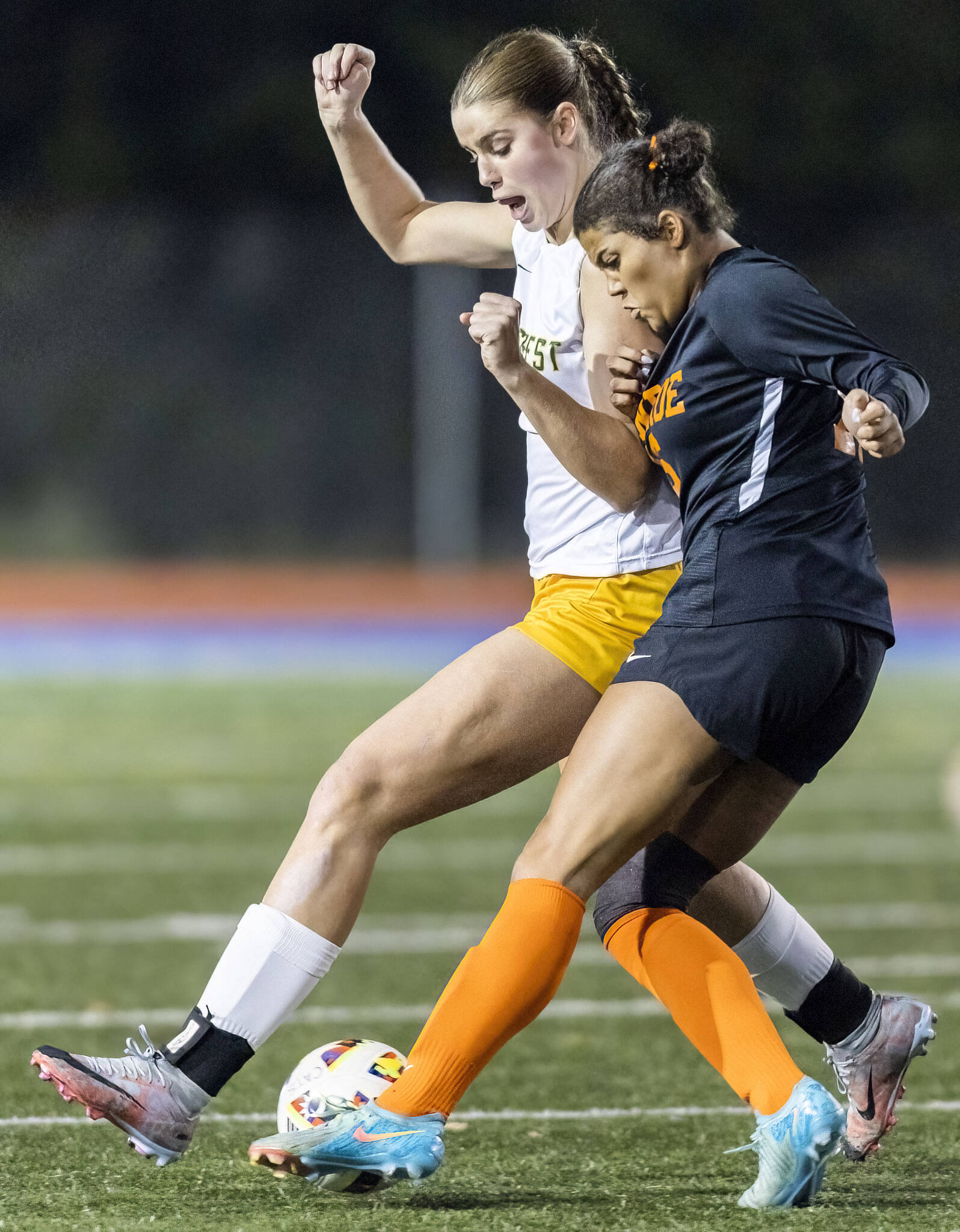 Shorecrest’s Cassie Chesnut and Monroe’s Addison Williams battle for the ball during the 3A district game on Thursday, Nov. 7, 2024 in Shoreline, Washington. (Olivia Vanni / The Herald)